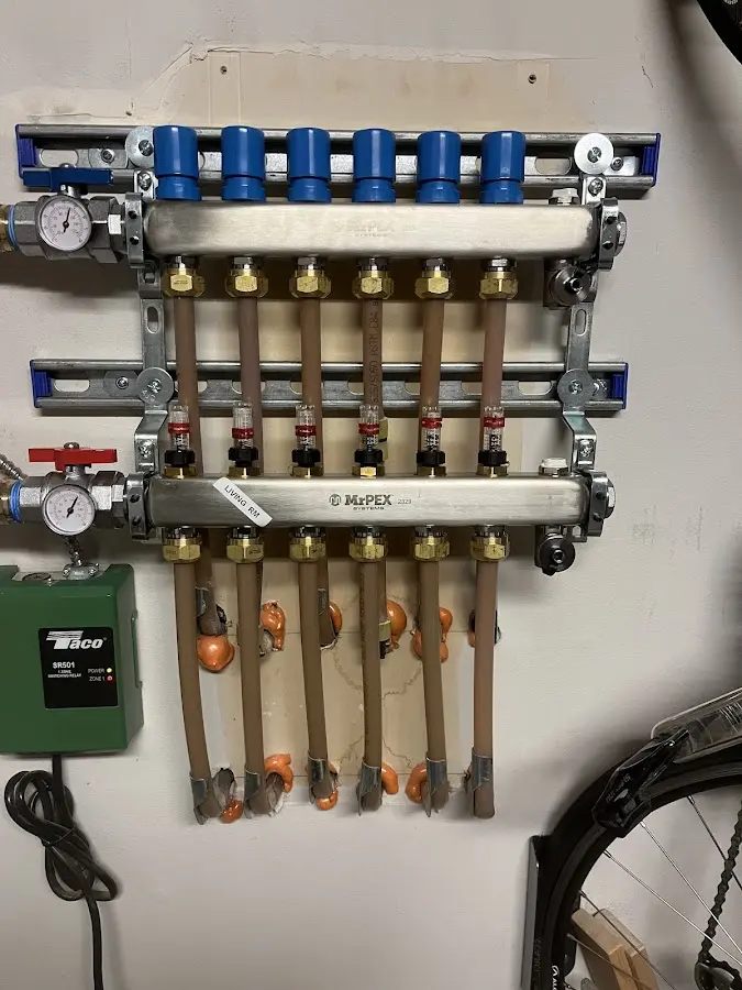 Plumber performing Water Heater Repair at a residential property in Allamuchy